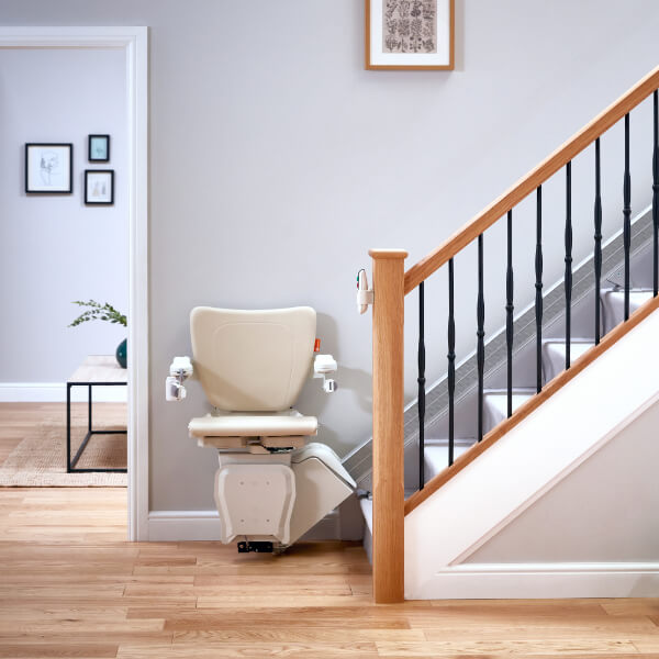 Handicare 1100 Straight Stairlift at the bottom of the stairs